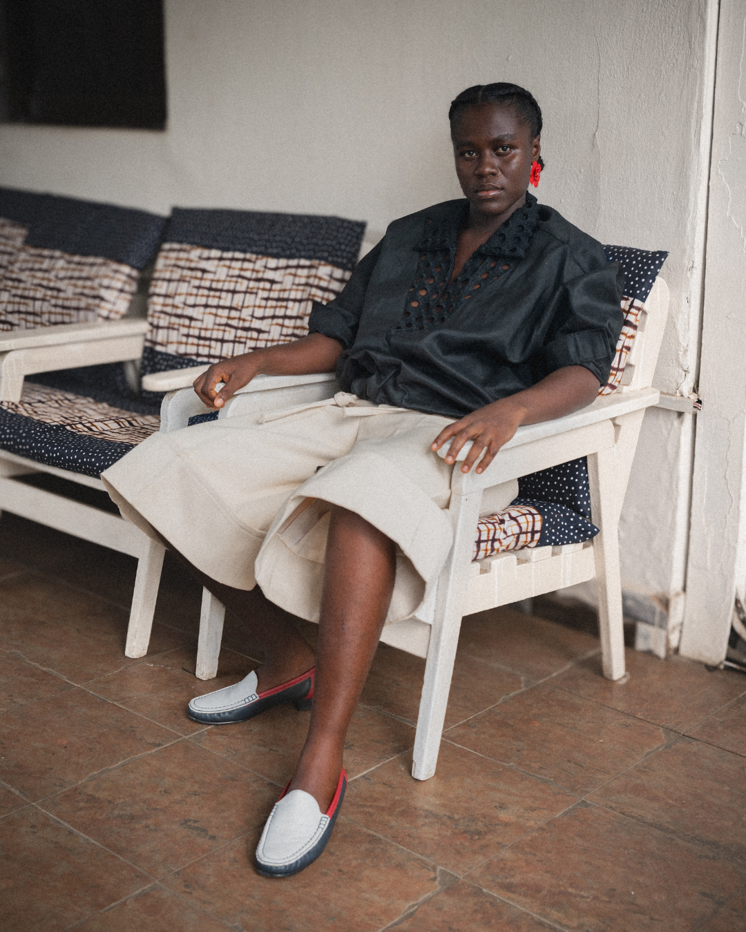 Ajabeng seated portrait